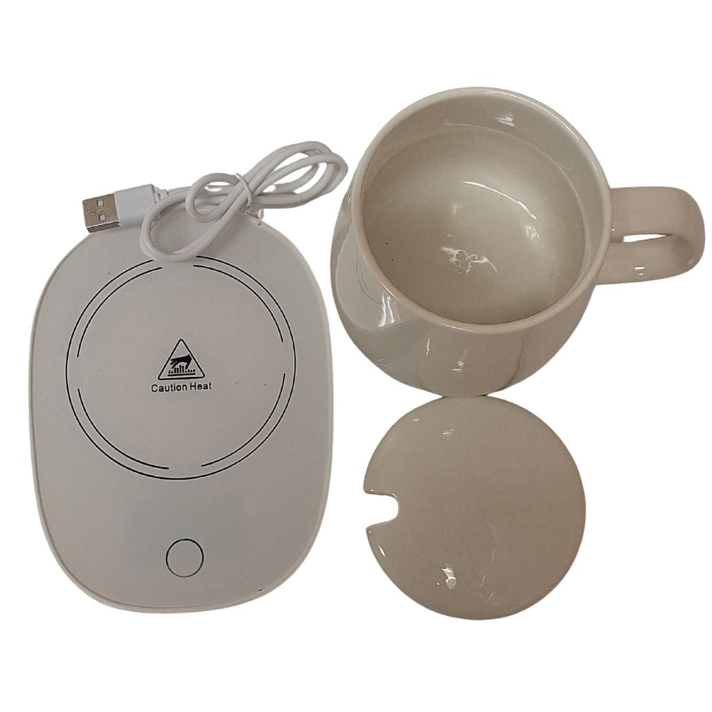 Tasse auto-chauffante sur bureau – Fidussia